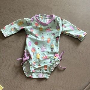 Ruffle Butts Mint Ice Cream & Treat Print One-Piece with Purple Trim